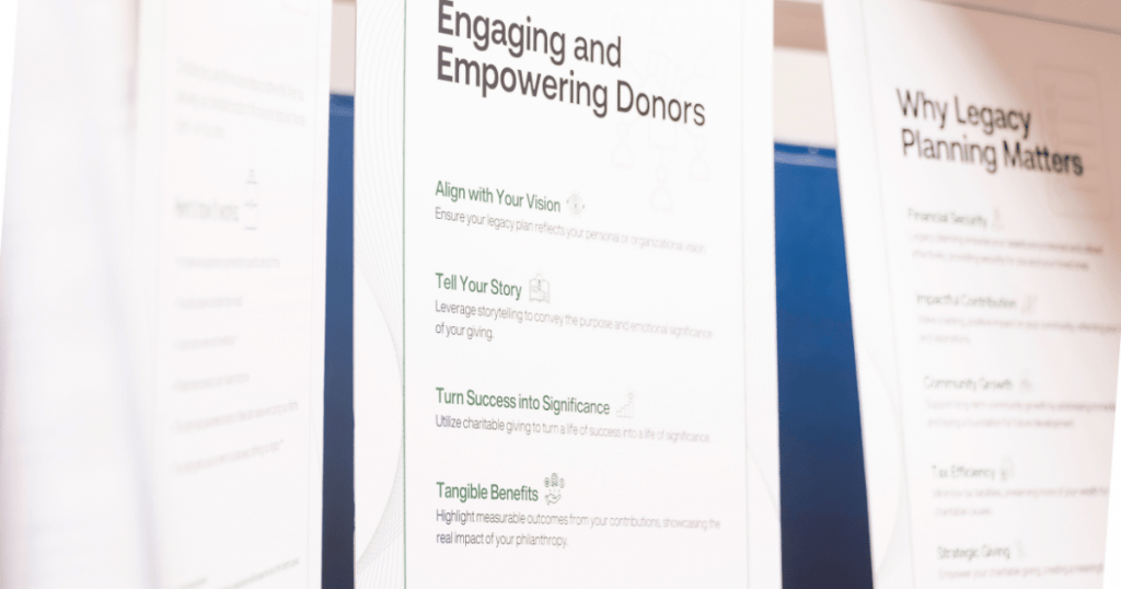 Close-up image of informational display panels discussing donor engagement and legacy planning. The central panel titled 'Engaging and Empowering Donors' outlines strategies like aligning with personal or organizational visions, leveraging storytelling, turning success into significance through charitable giving, and highlighting tangible benefits. Adjacent panels provide additional insights into the importance of legacy planning.