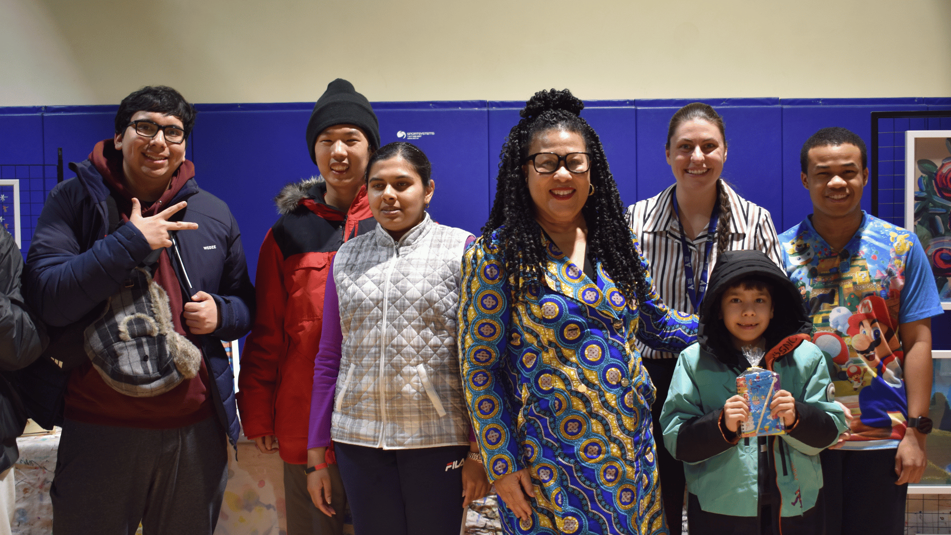 MPP Andrea Hazell and Jamie Laframboise standing with students from SAAAC Autism Centre’s arts program during an Ontario Trillium Foundation–supported recognition event in Scarborough.